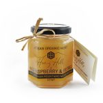 Organic Mountain Wild Raspberry & Fir Tree Honey in a jar, showcasing a blend of raspberry and fir flavours from Carpathian mountain hives.