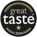 Great Taste Awards 2024 one-star logo showing a black circular badge with stylized gold curved lines, the text ‘great taste’ in white, and one gold star indicating a 1-star award for simply delicious food or drink