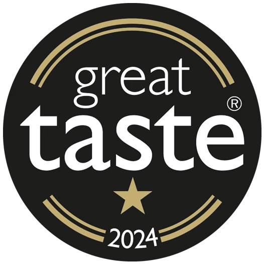 Great Taste Awards 2024 one-star logo showing a black circular badge with stylized gold curved lines, the text ‘great taste’ in white, and one gold star indicating a 1-star award for simply delicious food or drink
